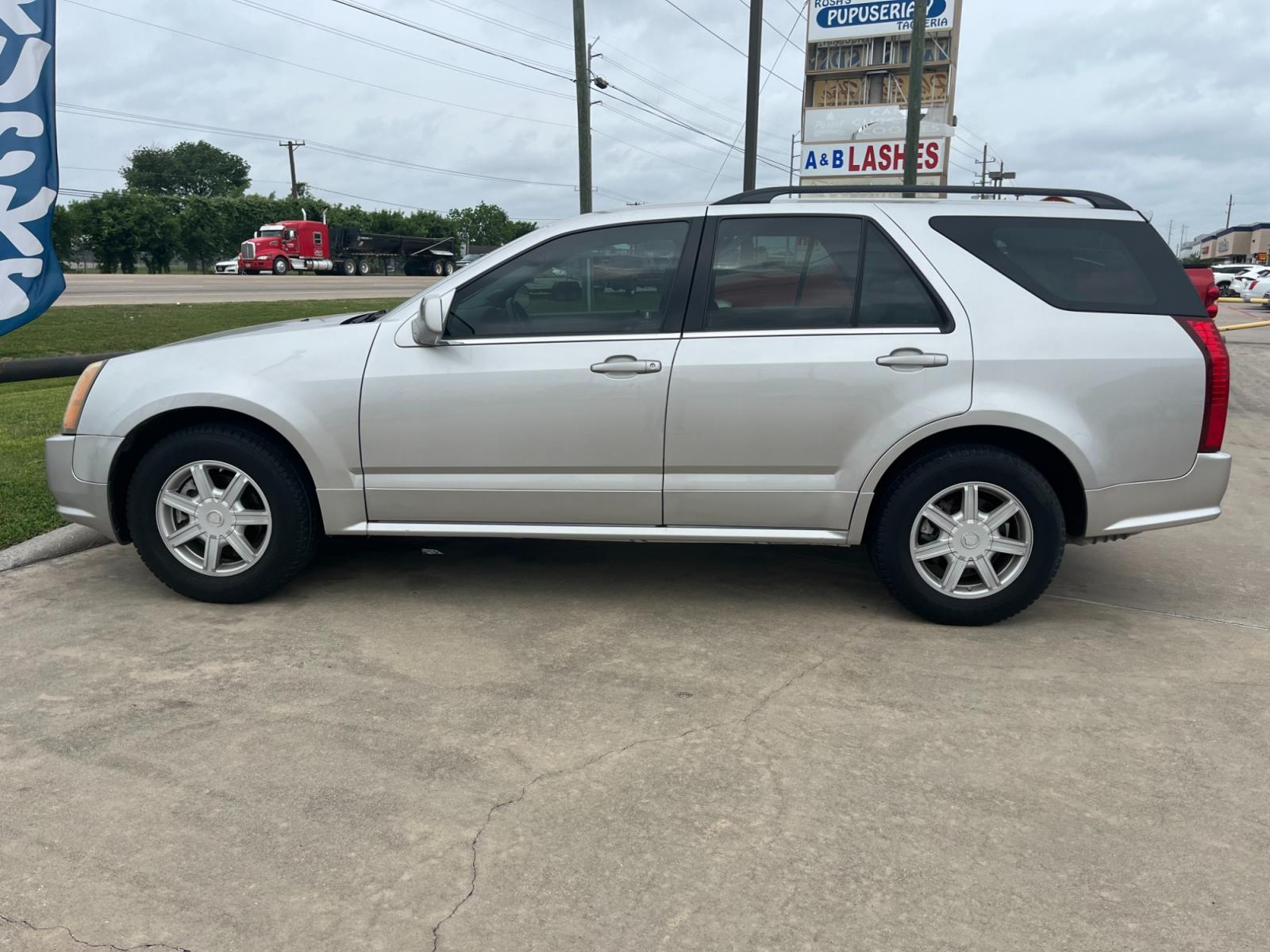 2004 SILVER /gray Cadillac SRX V6 (1GYDE637040) with an 3.6L V6 DOHC 24V engine, 5-Speed Automatic Overdrive transmission, located at 14700 Tomball Parkway 249, Houston, TX, 77086, (281) 444-2200, 29.928619, -95.504074 - Photo #3